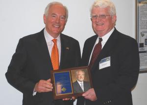 John Donnelly presenting award to A. Ross Myers. Mr Donnelly is the CEO of the L.F. Driscoll Company, LLC, a construction mangement company and one of the largest general contracting firms in the Philadelphia region.  He is a 1972 civil engineering graduate of Drexel University. 