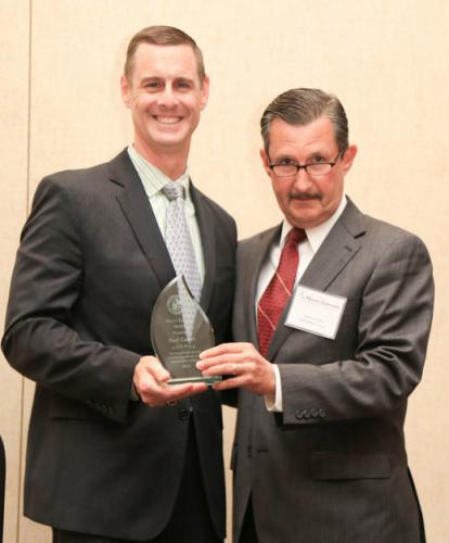 Paul Carter receives Myers-Lawson Award, presented by Robert Wells, MLSoC Industry Board Chair